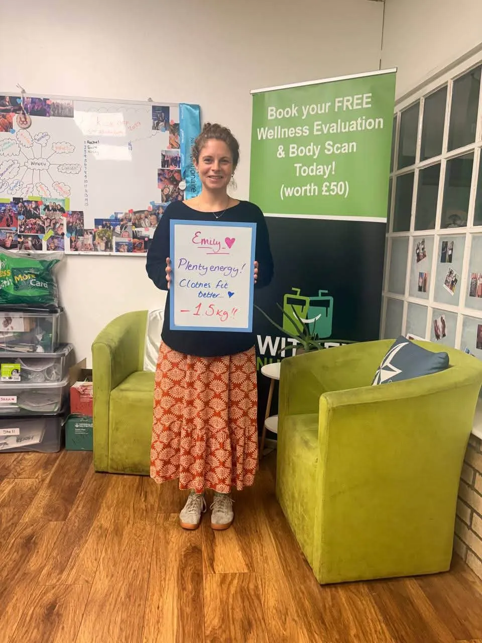 A Witney Nutrition Club member holding the board from their assessment